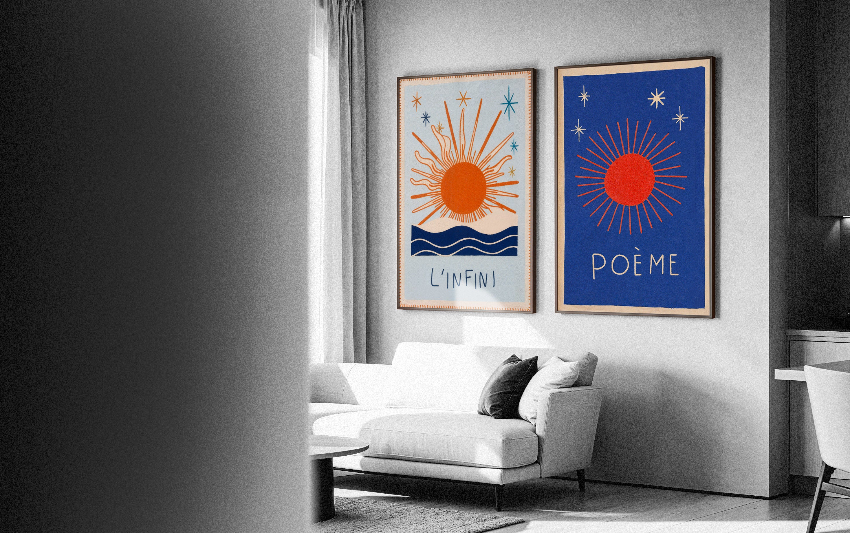 Living room with white sofa and two framed artworks on the wall.