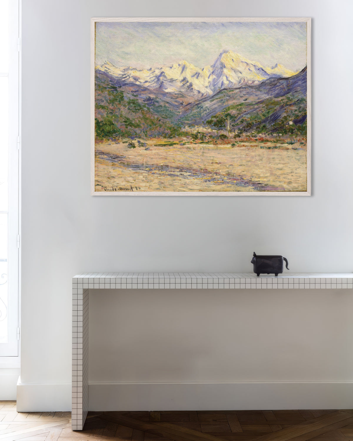 Poster of The Valley of the Nervia (1884) by Claude Monet, with white wooden frame